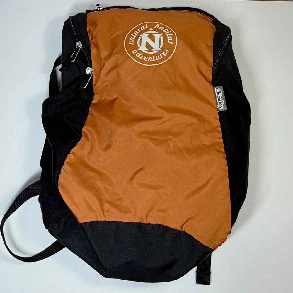 ChicoBag Natural Habitat Adventures Travel Pack Recycled Orange Black Backpack